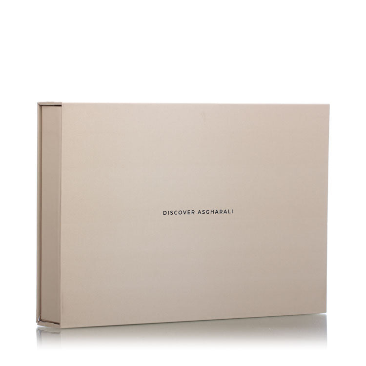 Minimalist Discover Asgharali closed box in beige color with clean branding