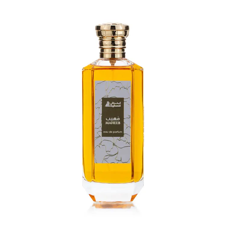 Maheeb Perfume bottle with gold cap on a white background
